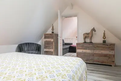 Un ou plusieurs lits dans un hébergement de l'établissement Country House - La Valentrée