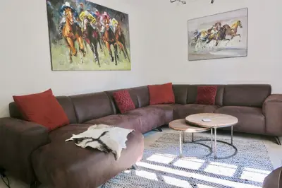 Coin salon dans l'établissement Country House - La Valentrée
