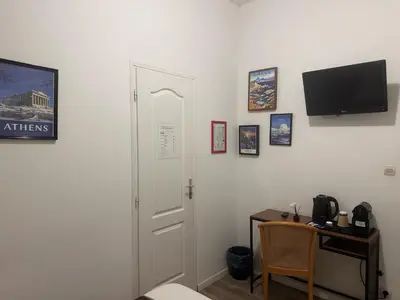Télévision ou salle de divertissement dans l'établissement Hotel Berthelot