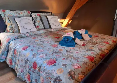 Un ou plusieurs lits dans un hébergement de l'établissement La Galuche-B&B & Studio