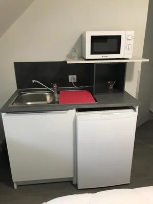 Cuisine ou kitchenette dans l'établissement La Bonne Franquette