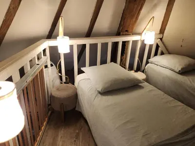 Un ou plusieurs lits dans un hébergement de l'établissement Le Moulin de la Motte Baudoin
