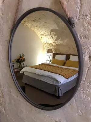 Un ou plusieurs lits dans un hébergement de l'établissement Chambre Troglodytique Villa Marie Louise