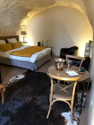 Un ou plusieurs lits dans un hébergement de l'établissement Chambre Troglodytique Villa Marie Louise