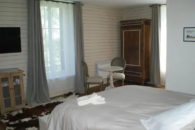 Un ou plusieurs lits dans un hébergement de l'établissement Le Chateau de la Barre