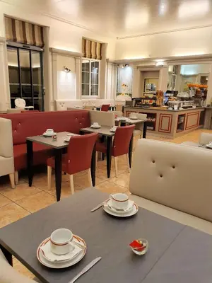 Coin salon dans l'établissement Best Western Central Hotel