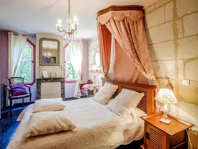 Un ou plusieurs lits dans un hébergement de l'établissement Clos du Bois Brard B&B