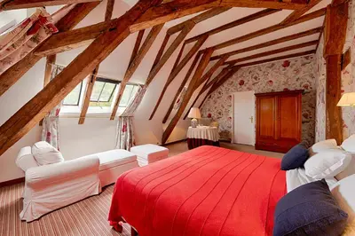 Un ou plusieurs lits dans un hébergement de l'établissement Château De La Bourdaisière