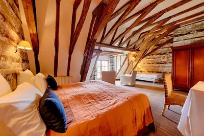 Un ou plusieurs lits dans un hébergement de l'établissement Château De La Bourdaisière