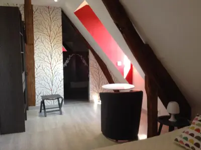 Un ou plusieurs lits dans un hébergement de l'établissement Chambre d'hôte du HOUSSAY à VALENNES 72320