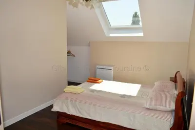 Un ou plusieurs lits dans un hébergement de l'établissement 13 Rue du Perré Maison de vacances
