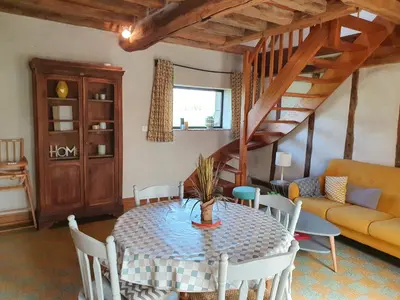 Coin salon dans l'établissement Gîte