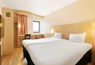 Un ou plusieurs lits dans un hébergement de l'établissement B&B HOTEL Le Mans Centre Cathédrale