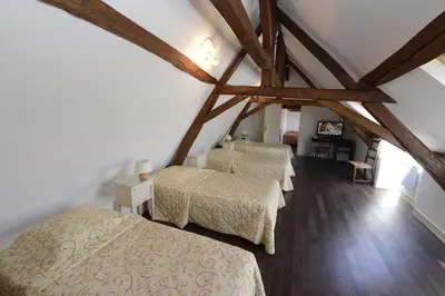 Un ou plusieurs lits dans un hébergement de l'établissement The Originals City, Hôtel Le Cheval Rouge, Tours Ouest