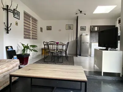 Télévision ou salle de divertissement dans l'établissement Gite Ecuries Vineuil Jump