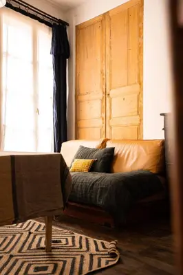 Un ou plusieurs lits dans un hébergement de l'établissement Maison Gaspard - Suites et appartements de charme à Saumur
