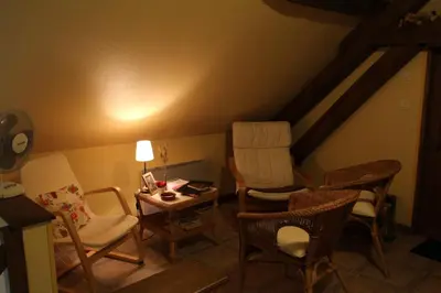 Coin salon dans l'établissement Le Clos de Châtres