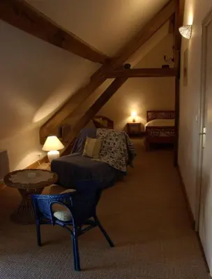 Un ou plusieurs lits dans un hébergement de l'établissement Le Clos de Châtres