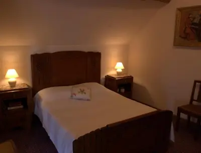 Un ou plusieurs lits dans un hébergement de l'établissement Le Clos de Châtres