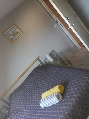 Un ou plusieurs lits dans un hébergement de l'établissement Chambres d'hôtes Sébastien