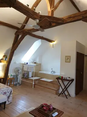 Coin salon dans l'établissement Le Clos de Ligré