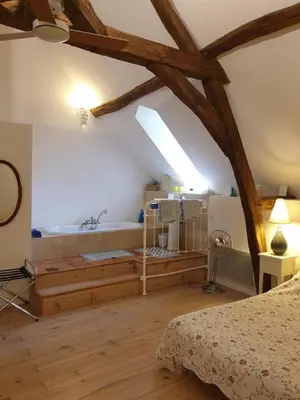 Un ou plusieurs lits dans un hébergement de l'établissement Le Clos de Ligré
