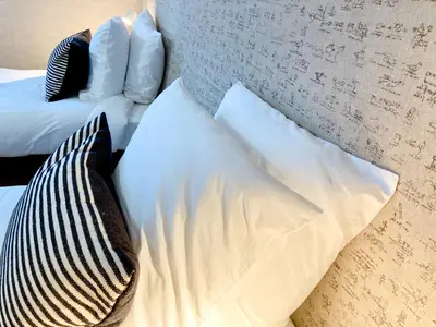 Un ou plusieurs lits dans un hébergement de l'établissement Gites-domainedupin, cottage 