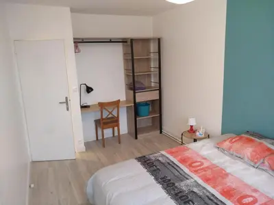 Un ou plusieurs lits dans un hébergement de l'établissement Nouveau! Appartement 80m2 tout neuf avec 3 belles chambres