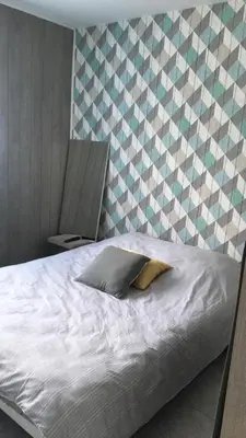 Un ou plusieurs lits dans un hébergement de l'établissement chambre proche du circuit des 24h