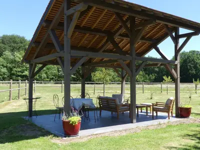 Jardin de l'établissement Chambres et Table d'Hôtes Les Machetières