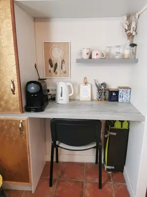 Cuisine ou kitchenette dans l'établissement Petit havre de tranquillité