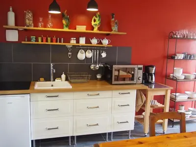 Cuisine ou kitchenette dans l'établissement Chambres d'Hôtes Rue du Poids
