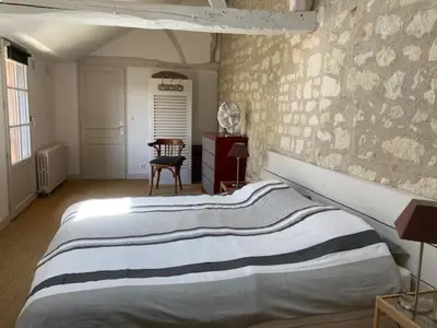 Un ou plusieurs lits dans un hébergement de l'établissement Chambres d'Hôtes Rue du Poids