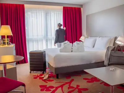 Un ou plusieurs lits dans un hébergement de l'établissement Mercure Tours Nord