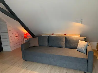 Coin salon dans l'établissement Chambre en campagne
