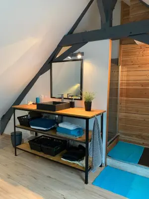 Télévision ou salle de divertissement dans l'établissement Chambre en campagne