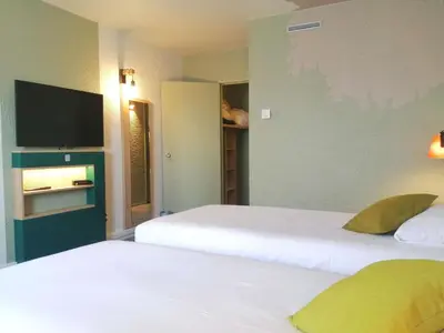 Un ou plusieurs lits dans un hébergement de l'établissement ibis Styles Tours Sud