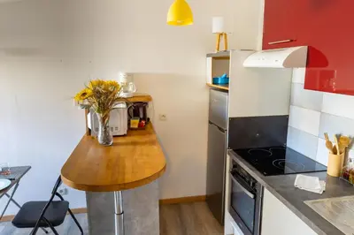 Cuisine ou kitchenette dans l'établissement Cocooning Place