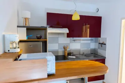 Cuisine ou kitchenette dans l'établissement Cocooning Place