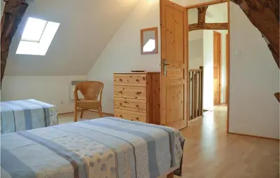 Un ou plusieurs lits dans un hébergement de l'établissement Stunning Home In Parcay Les Pins