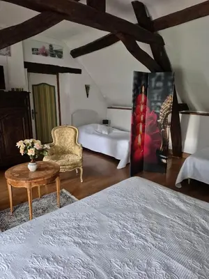 Un ou plusieurs lits dans un hébergement de l'établissement Le Moulin Garnier