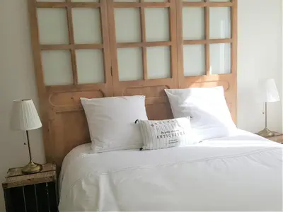 Un ou plusieurs lits dans un hébergement de l'établissement Guest house 
