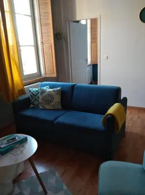 Coin salon dans l'établissement Appartement calme proche de la Loire