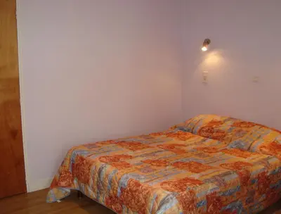 Un ou plusieurs lits dans un hébergement de l'établissement Splendid Hôtel