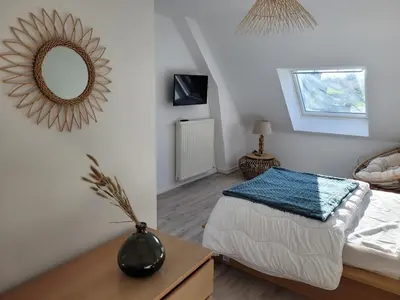 Un ou plusieurs lits dans un hébergement de l'établissement Gîte Évasion idyllique à l'étage près zoo-chateaux