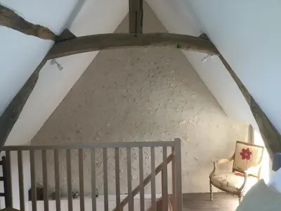 Un ou plusieurs lits dans un hébergement de l'établissement Maison d Hôtes La Petite Jucherie