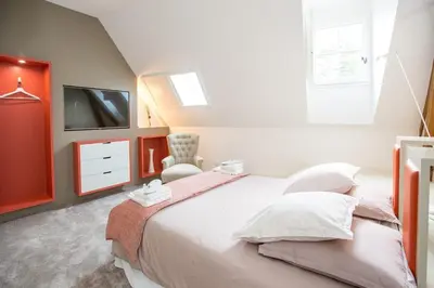 Un ou plusieurs lits dans un hébergement de l'établissement Les Suites du Château de Cheverny
