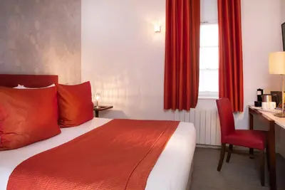 Un ou plusieurs lits dans un hébergement de l'établissement Le Mans Country Club