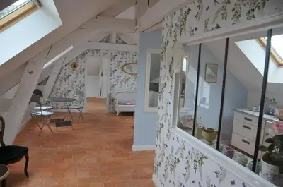 Coin salon dans l'établissement L'Orangerie du Château - LE NID - GITE 2 Personnes