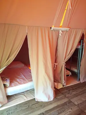 Un ou plusieurs lits dans un hébergement de l'établissement Camping de Marcilly sur Vienne